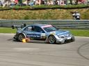 A photo of a DTM Mercedes-Benz shooting flames on gear change