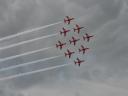 A photo of the Red Arrows flying over the main stage at Global Gathering 2007